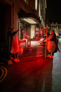 Media Revolution activists dressed as penguins at the Daily Mail HQ